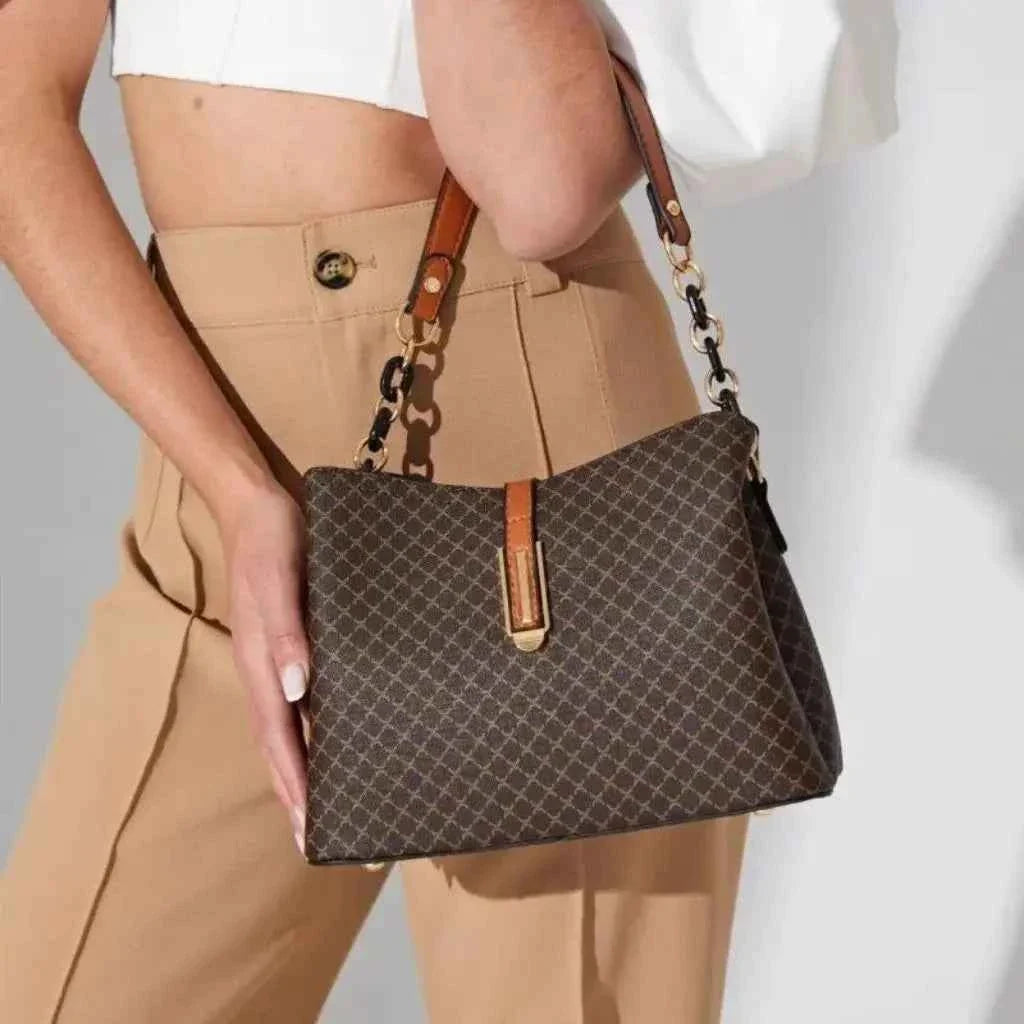 Bolsa Tote Feminina Estruturada de Couro Granulado com Alças Arquitetônicas de Metal – Nelilia