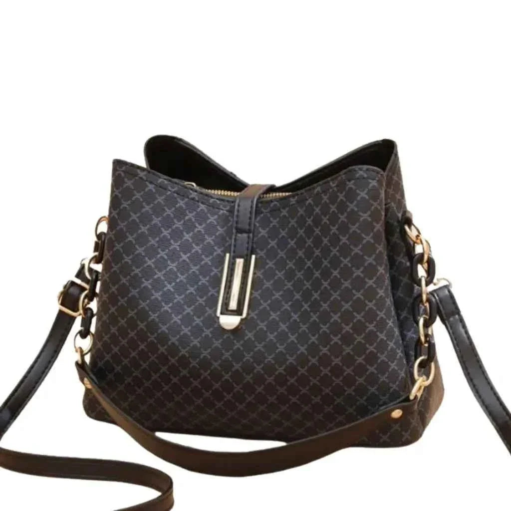 Bolsa Tote Feminina Estruturada de Couro Granulado com Alças Arquitetônicas de Metal – Nelilia