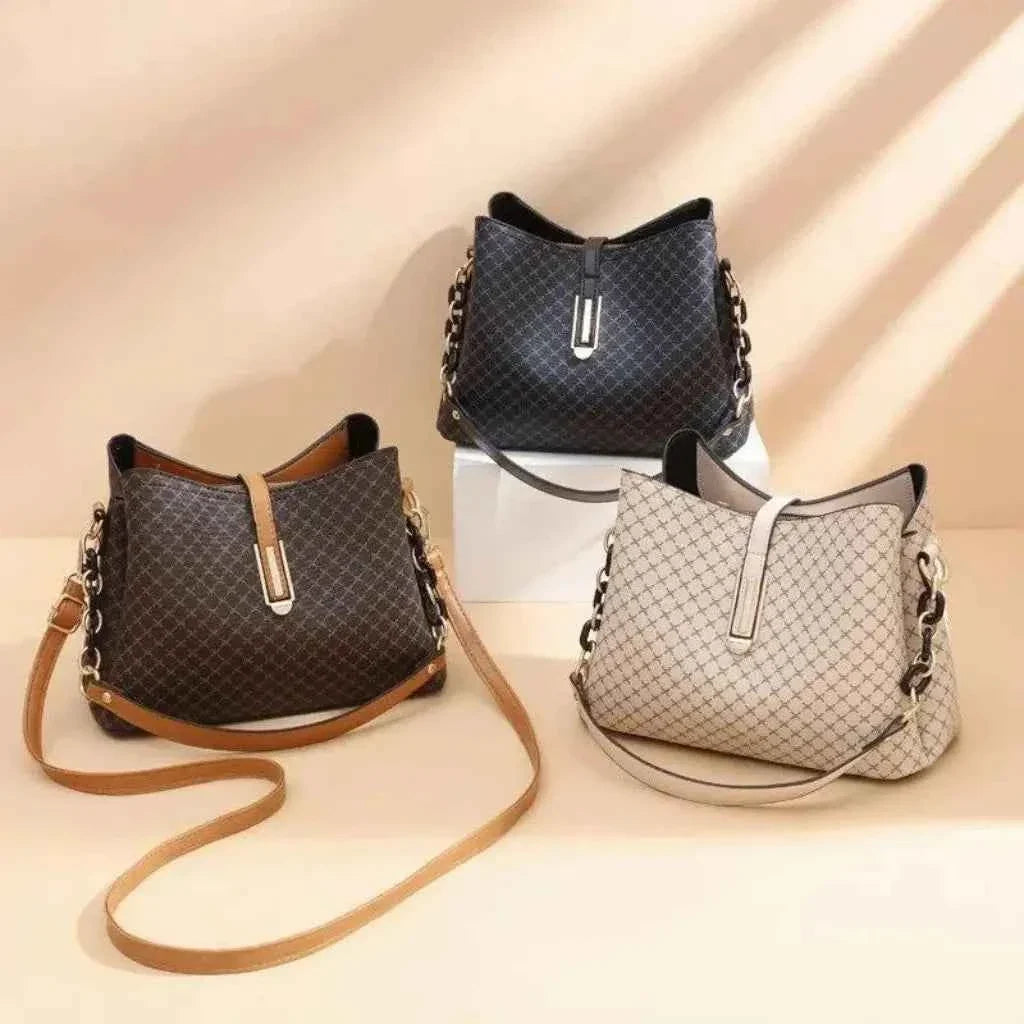 Bolsa Tote Feminina Estruturada de Couro Granulado com Alças Arquitetônicas de Metal – Nelilia