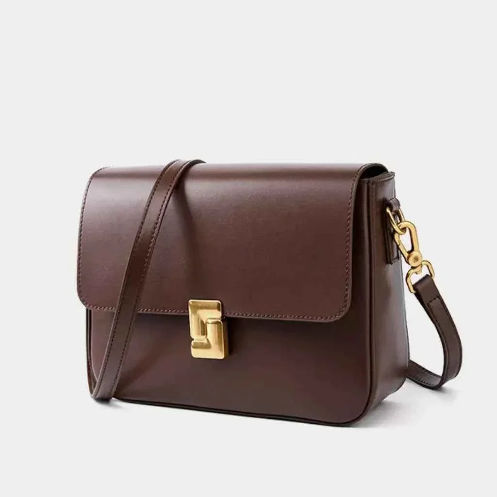 Bolsa Transversal Feminina Estruturada com Aba e Fecho Dourado – Velalina
