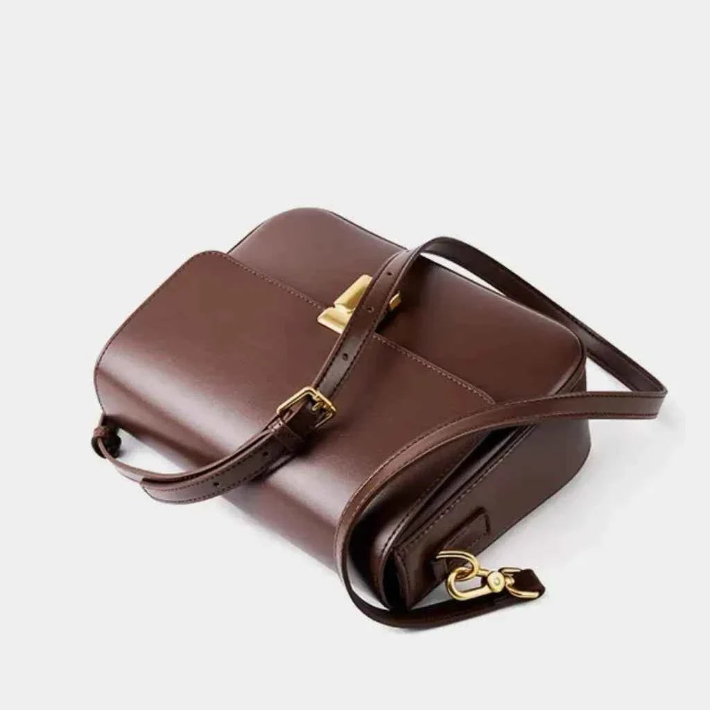 Bolsa Transversal Feminina Estruturada com Aba e Fecho Dourado – Velalina