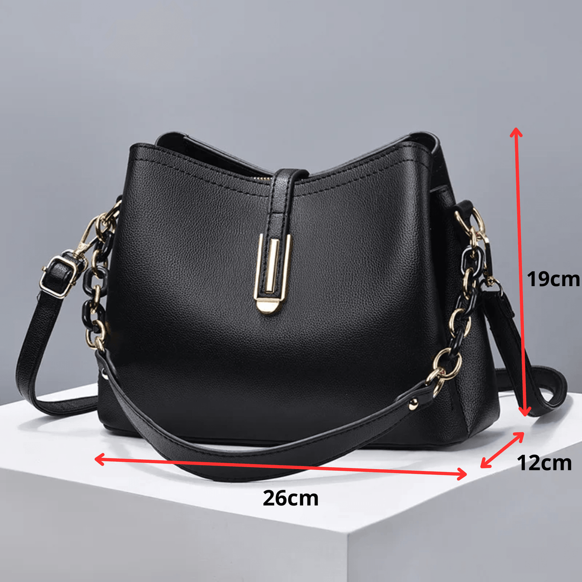 Bolsa Saco Feminina Estruturada em Couro PU com Alça de Corrente – Alelia